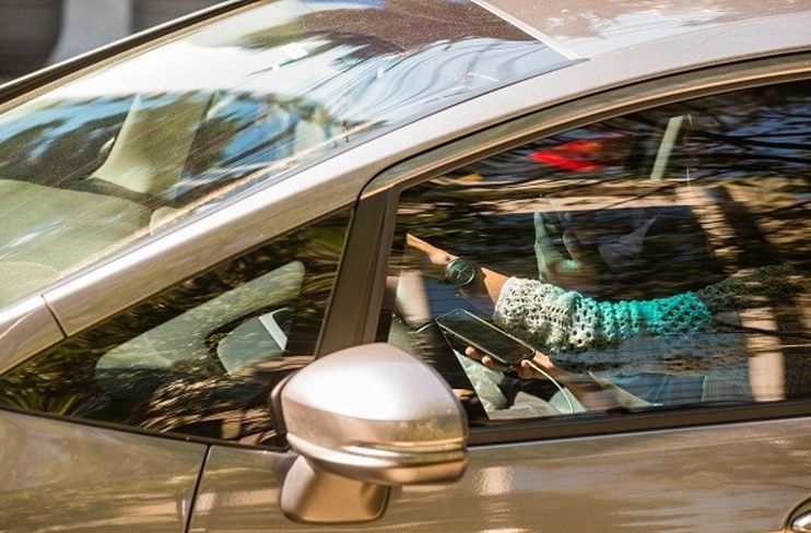 infração celular ao volante