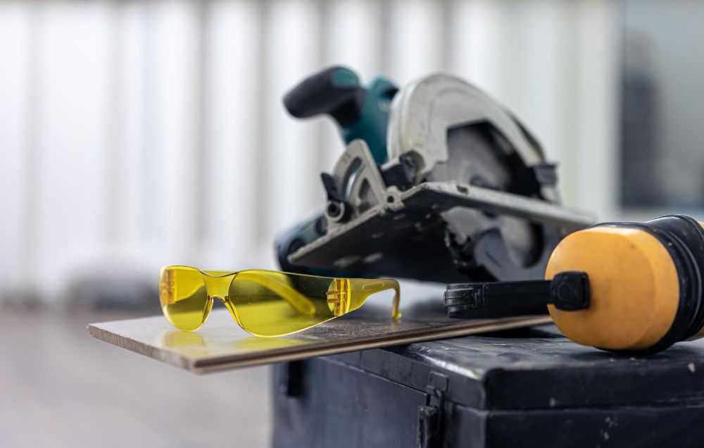 close-up-of-construction-safety-goggles-and-work-tools
