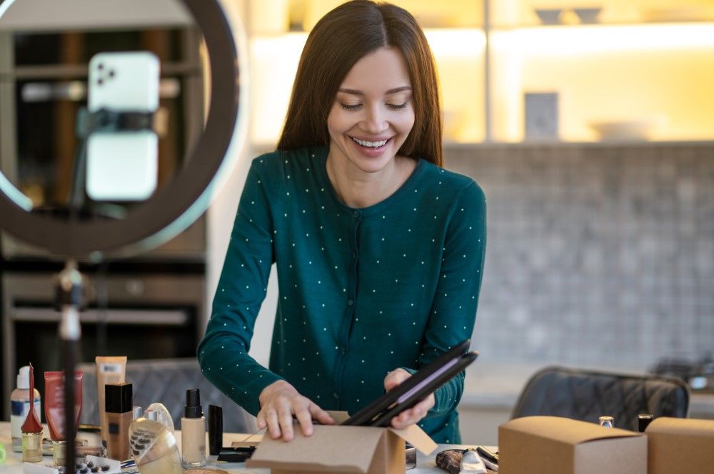 Smiling young woman showing tips on haircare