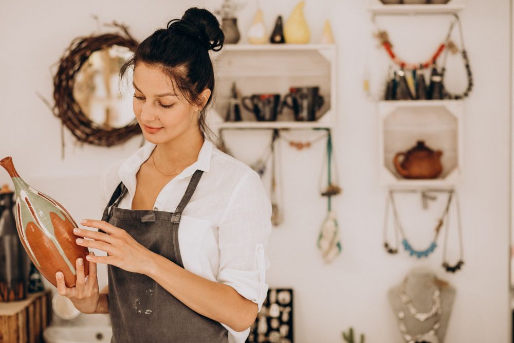 woman-craftmaster-at-a-pottery-shop